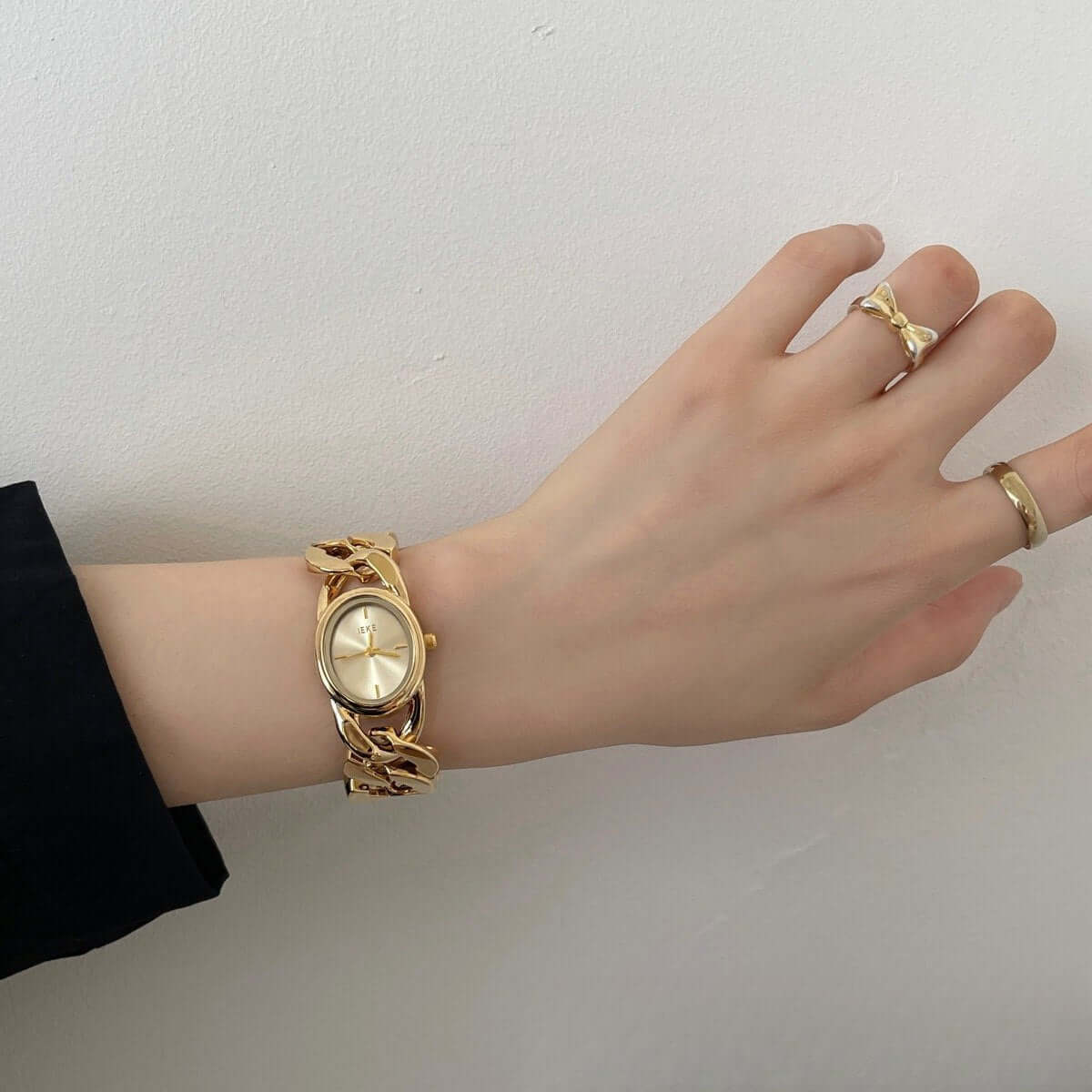 A stylish hand wearing a gold vintage watch, showcasing vintage watches in UAE for an elegant look.